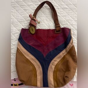 Fossil multicolor bag with pink bow and other attachments